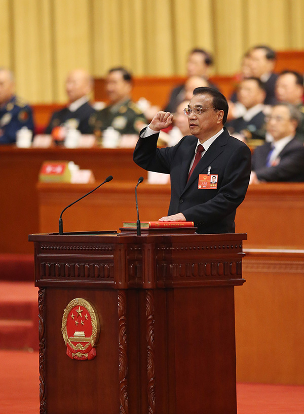  十三届全国人大一次会议举行第六次全体会议  根据国家主席习近平的提名决定李克强为国务院总理 国家主席习近平签署主席令任命